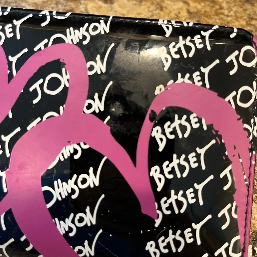 Betsey Johnson Black and Pink Wristlet with Heart Design